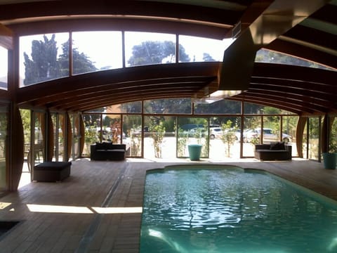 Indoor pool, open 10:00 AM to 10:00 PM, sun loungers