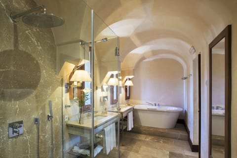 Separate tub and shower, eco-friendly toiletries, hair dryer, bathrobes