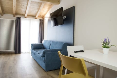 Superior Double Room | Living area | Flat-screen TV