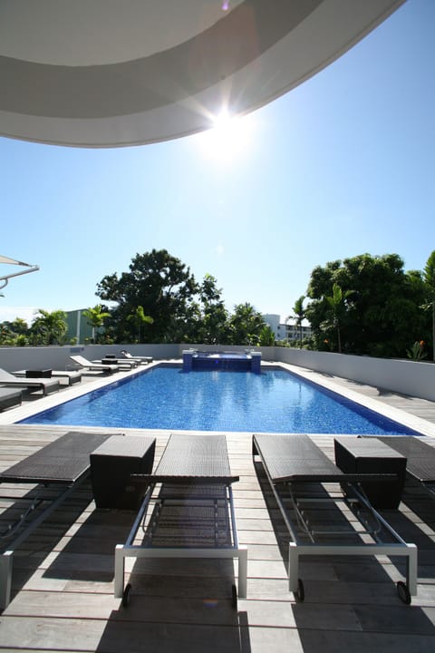 Outdoor pool, pool umbrellas, sun loungers