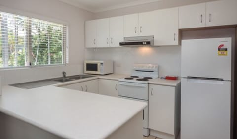 Apartment, 2 Bedrooms | Private kitchen | Full-size fridge, microwave, oven, electric kettle