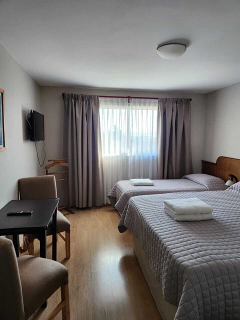 Standard Triple Room | In-room safe, individually decorated, individually furnished, desk