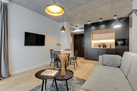 Deluxe Apartment, 2 Bedrooms | Living area | Flat-screen TV