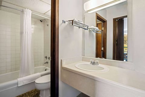 Suite, 1 King Bed, Refrigerator | Bathroom | Shower, hair dryer, towels