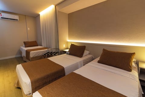 Standard Triple Room | Minibar, desk, free WiFi, bed sheets