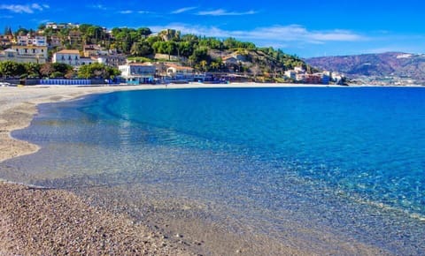 Beach nearby, white sand, sun loungers, beach umbrellas