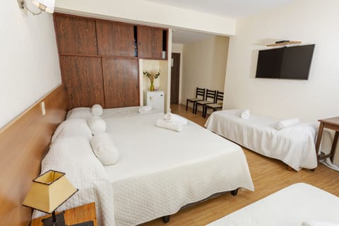 Standard Quadruple Room | Memory foam beds, minibar, in-room safe, individually decorated