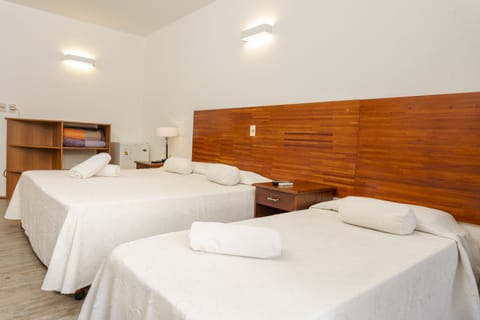 Standard Triple Room | Memory foam beds, minibar, in-room safe, individually decorated