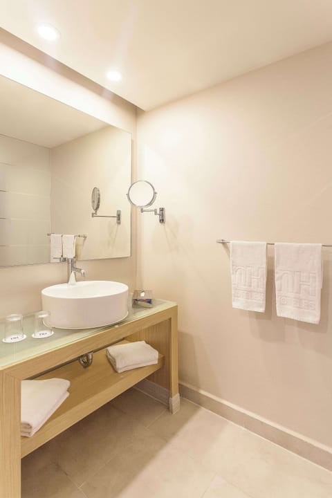 Shower, rainfall showerhead, designer toiletries, hair dryer