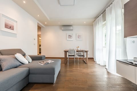 Apartment, 3 Bedrooms | Living area | Smart TV