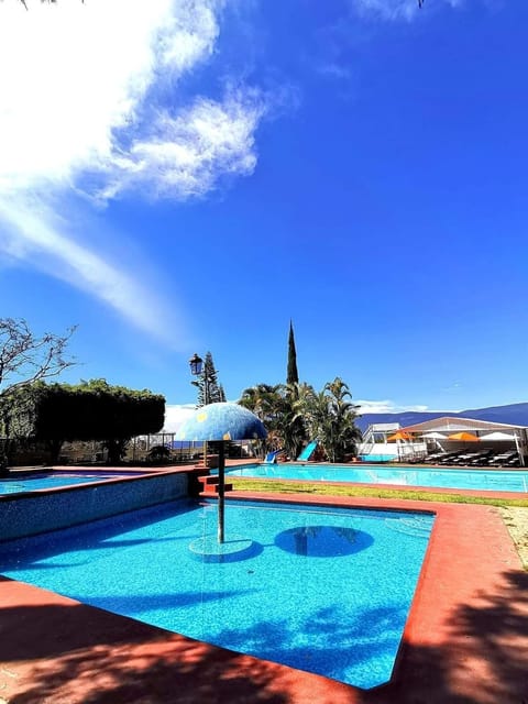 Outdoor pool, open 9:00 AM to 6:00 PM, sun loungers