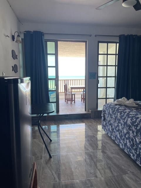 Comfort Room, 1 King Bed, Sea View | Beach/ocean view