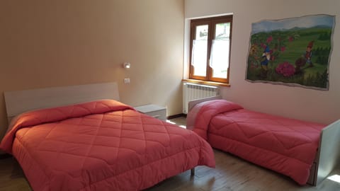 Triple Room, Multiple Beds | In-room safe, desk, free WiFi, bed sheets