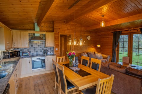 Kingfisher Log Cabin | Living area | Flat-screen TV