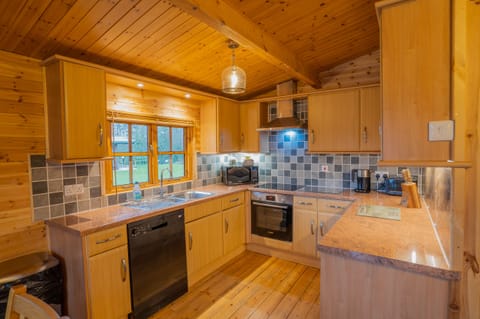 Deer Walk Log Cabin | Private kitchen | Full-size fridge, stovetop, electric kettle, toaster