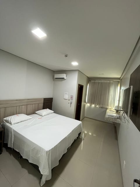 Basic Double Room | Blackout drapes, iron/ironing board, free WiFi, bed sheets