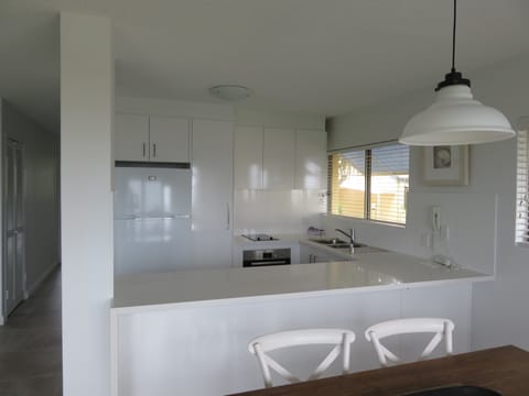 Apartment, 2 Bedrooms, Ensuite, Ocean View | Private kitchen | Full-size fridge, microwave, stovetop, dishwasher