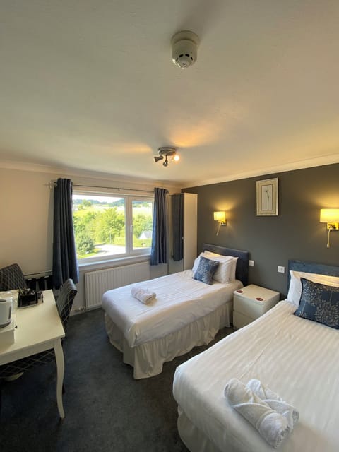 Twin Room | Individually decorated, individually furnished, free WiFi, bed sheets