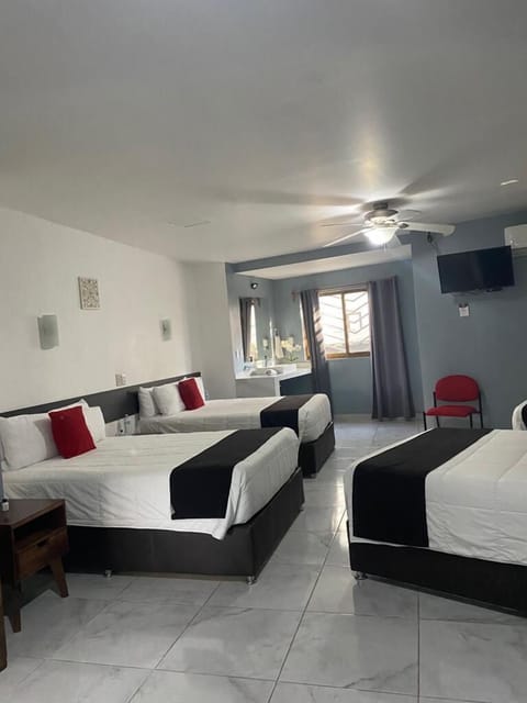 Standard Room, Multiple Beds | Desk, free WiFi, bed sheets