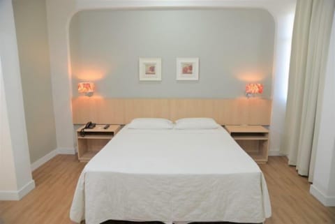 Standard Double or Twin Room | Minibar, desk, blackout drapes, free WiFi