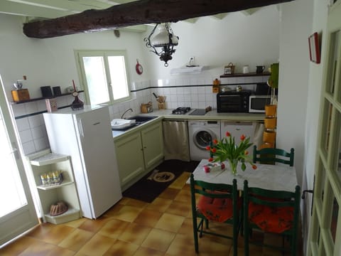 Family Cottage, 2 Bedrooms, Terrace (Le Logis du Meunier) | Private kitchen | Highchair