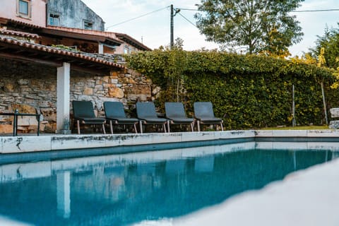 Seasonal outdoor pool, pool umbrellas, sun loungers