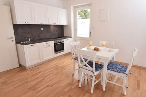 Premium Studio, Sea View | Private kitchen | Full-size fridge, stovetop, coffee/tea maker, electric kettle