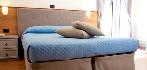 Double or Twin Room | In-room safe, iron/ironing board, free cribs/infant beds, free WiFi