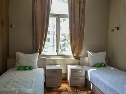 Twin Room | Blackout drapes, iron/ironing board, free WiFi, bed sheets