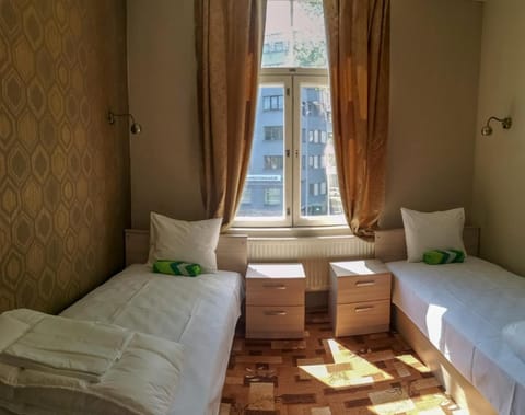 Twin Room | Blackout drapes, iron/ironing board, free WiFi, bed sheets