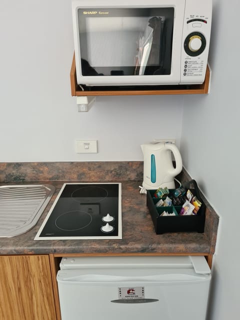 Two Bedrooms Unit | Private kitchen | Mini-fridge, microwave, coffee/tea maker, electric kettle