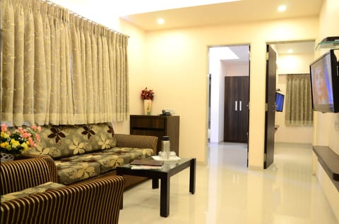 Family Suite (AC) | Living area | LED TV