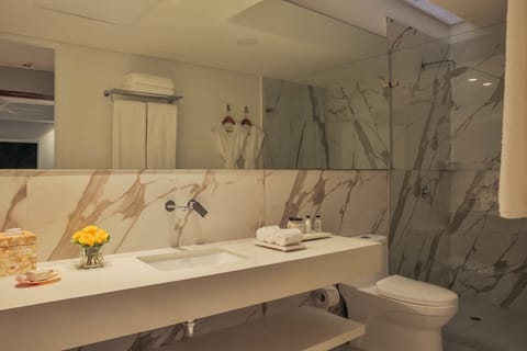 Suite | Bathroom | Shower, rainfall showerhead, hair dryer, bathrobes