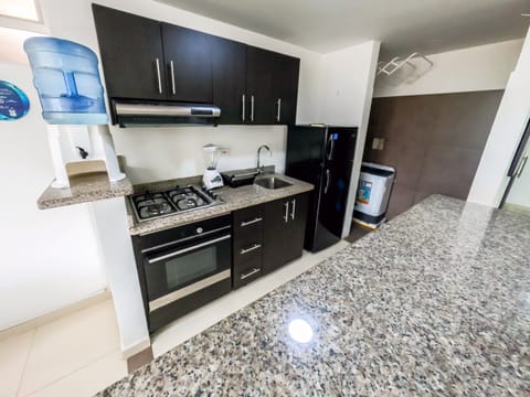 Suite, 1 Bedroom (Mini) | Private kitchen | Coffee/tea maker, dining tables