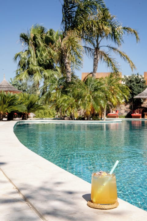 Seasonal outdoor pool, pool umbrellas, sun loungers