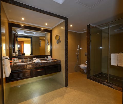 Stella Suite | Bathroom | Bathtub, hair dryer, bathrobes, slippers