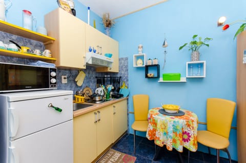 Apartment (A2) | Private kitchen | Fridge, microwave, stovetop, coffee/tea maker