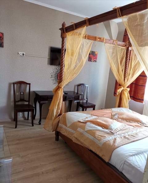 Family Quadruple Room | 1 bedroom, minibar, desk, blackout drapes