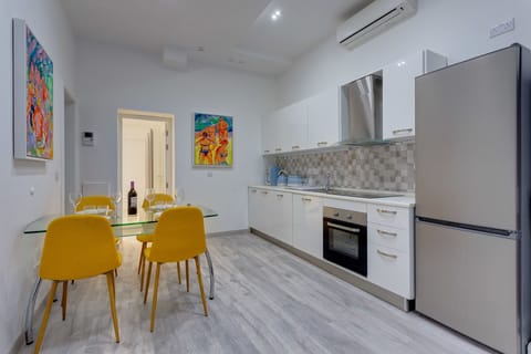 Apartment, 3 Bedrooms | Private kitchen | Oven, toaster, highchair, cookware/dishes/utensils