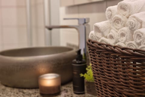 Hair dryer, bathrobes, towels, soap