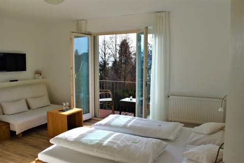 Double Room, Balcony, Garden View | Hypo-allergenic bedding, in-room safe, desk, laptop workspace