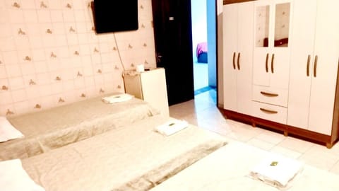 Triple Room, Multiple Beds | Minibar, free WiFi, bed sheets