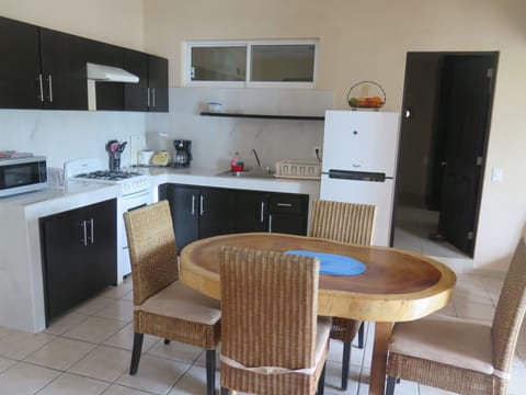 Standard Apartment, 2 Bedrooms | Private kitchen | Fridge, microwave, stovetop, coffee/tea maker