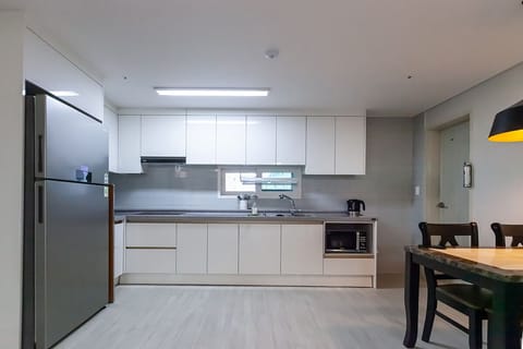 Penthouse, 3 Bedrooms, Non Smoking, City View | Private kitchen | Fridge, microwave, coffee/tea maker, electric kettle