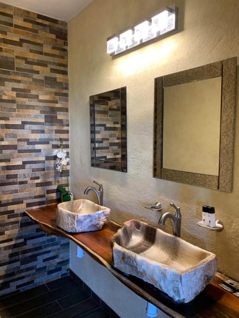 Premium Cabin | Bathroom | Designer toiletries, hair dryer, bathrobes, towels