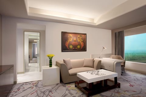 Executive Suite, 1 Bedroom, Non Smoking | Living room | 37-inch plasma TV with digital channels, TV, DVD player