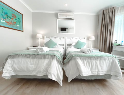 Twin Room  | Select Comfort beds, in-room safe, individually decorated