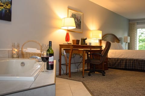 Deluxe Room, Jetted Tub | Iron/ironing board, free cribs/infant beds, free WiFi, bed sheets