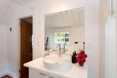 Ponga Suite | Bathroom | Designer toiletries, hair dryer, bathrobes, towels