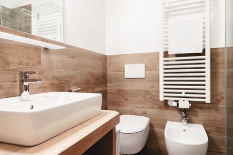 Double Room (Saslong F) | Bathroom | Hair dryer, bathrobes, slippers, towels